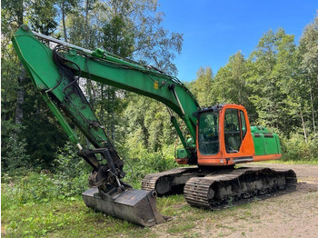 Гусеничный экскаватор NEW HOLLAND E215B