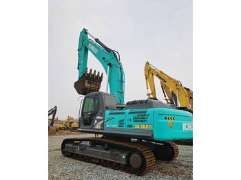 Гусеничный экскаватор KOBELCO