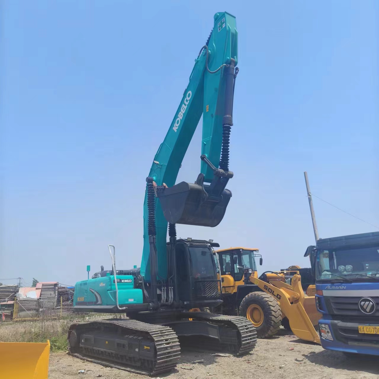 Гусеничный экскаватор KOBELCO